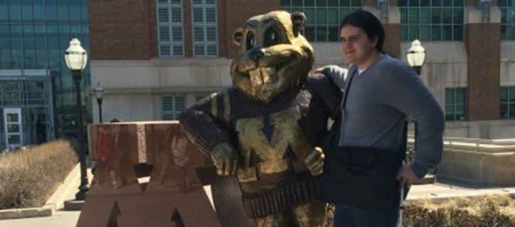 Lucas with University of Minnesota golden gopher mascot