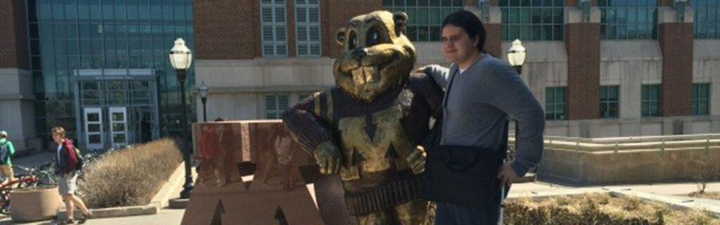 Lucas with University of Minnesota golden gopher mascot