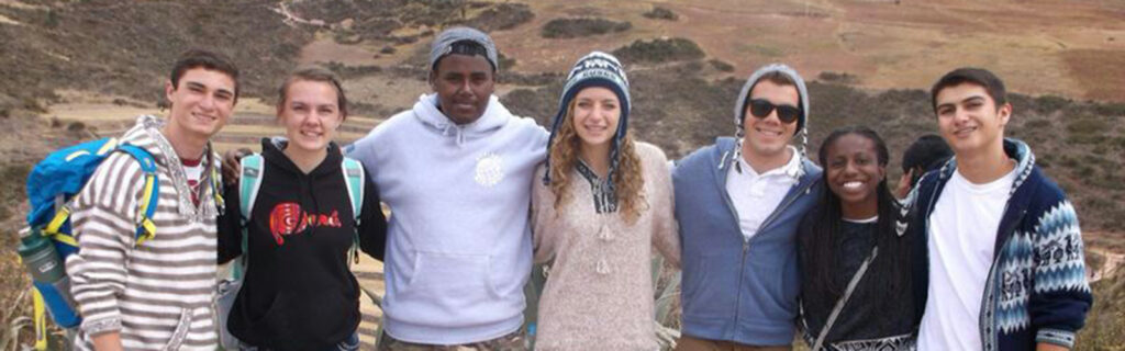 Austin Bates (left) who has diabetes with other diverse volunteers in Peru