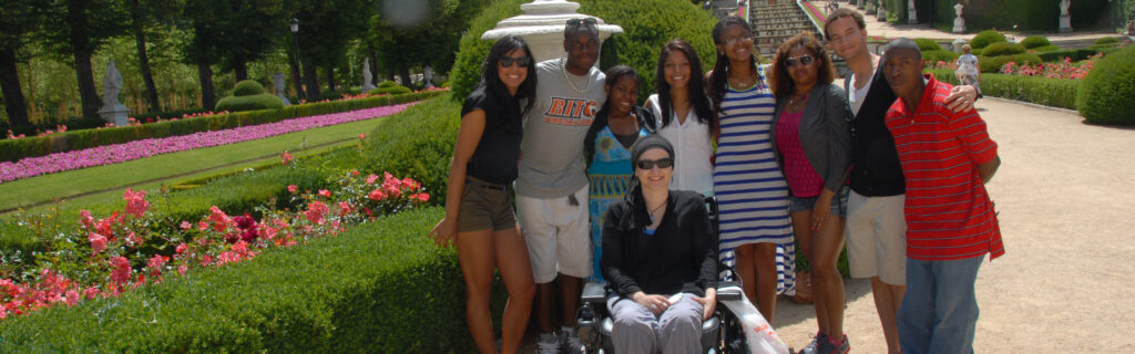 Group of students in an international park, one uses a wheelchair