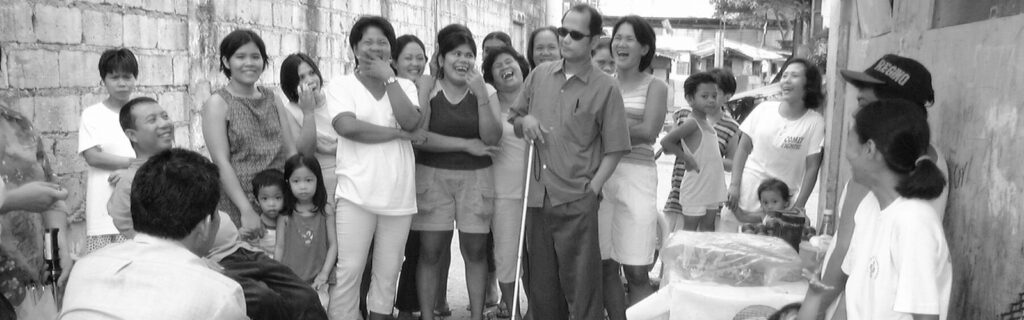 Blind man with international group