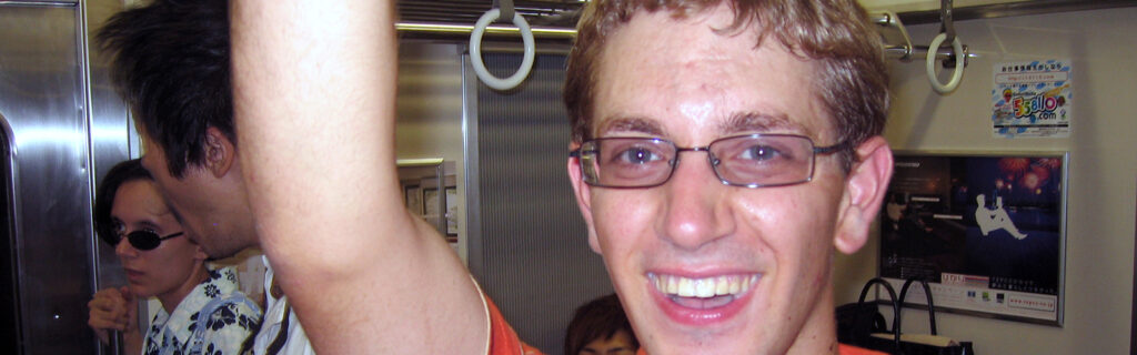 Close up photo of an American young man smiling