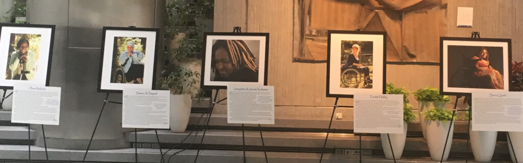 The photo exhibit displayed on easels