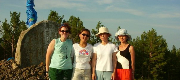 Annie stands alongside some of her Mongolian colleagues while on summer vacation together