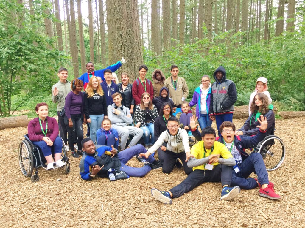 FLEX YES challenge course - Group of 20 or so teens of different races and genders, with apparent and non-apparent disabilities