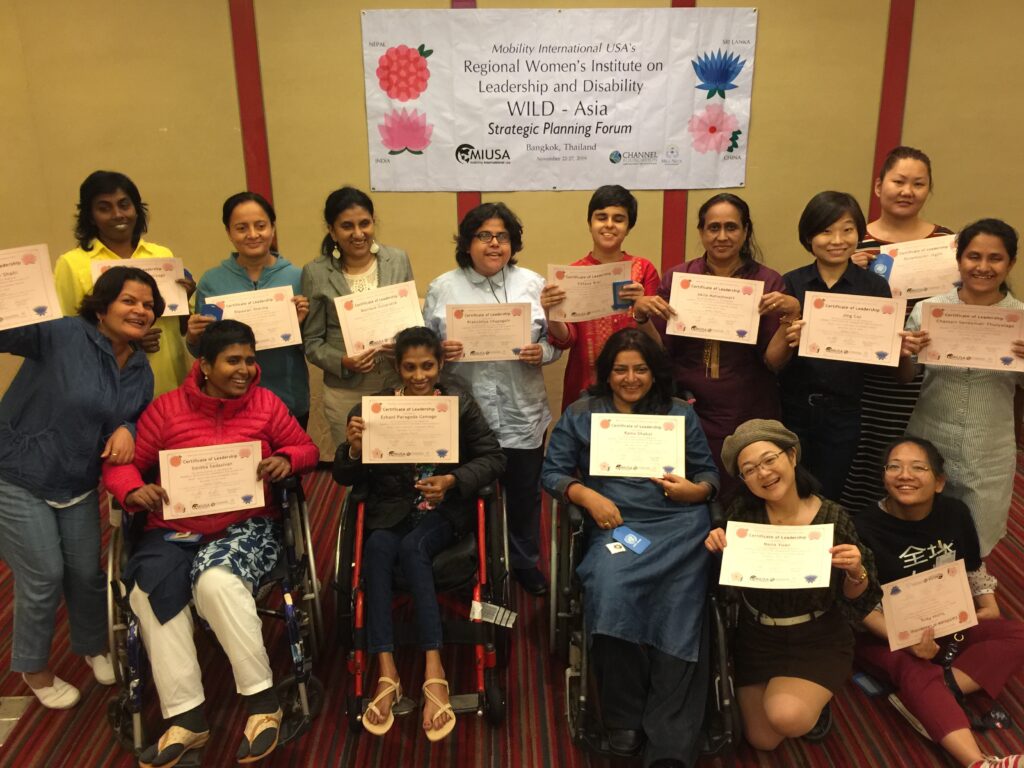 Group photo of WILD Asia delegates holding certificates of completion