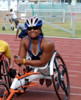 Anjali in racing chair and helmet on track